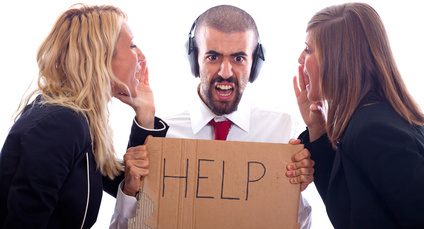 Businessman with Ear Protectors Hold Help Sign between Screaming Businesswoman